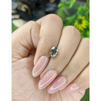1.52 Ct. Yellowish Green Sapphire from Tanzania Life Style