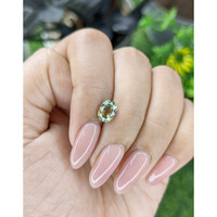 1.38 Ct. Yellowish Green Sapphire from Tanzania Life Style