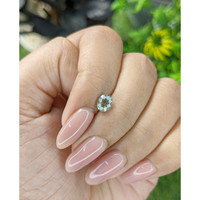 0.92 Ct. Yellowish Green Sapphire from Tanzania Life Style