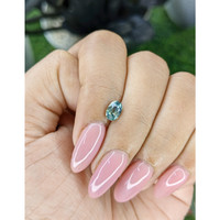 0.86 Ct. Bluish Green Sapphire from Madagascar Life Style