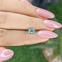 0.86 Ct. Bluish Green Sapphire from Madagascar Life Style