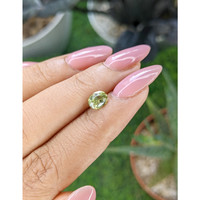 1.14 Ct. Yellowish Green Sapphire from Madagascar Life Style