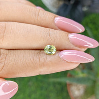 1.14 Ct. Yellowish Green Sapphire from Madagascar Life Style