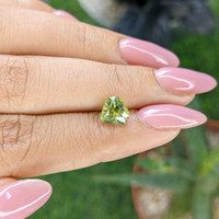 2.06 Ct. Yellowish Green Sapphire from Madagascar Life Style