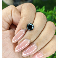 1.91 Ct. Bluish Green Sapphire from Madagascar Life Style