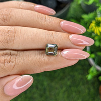 2.55 Ct. Brownish Green Sapphire from Madagascar Life Style
