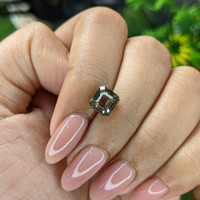 2.55 Ct. Brownish Green Sapphire from Madagascar Life Style