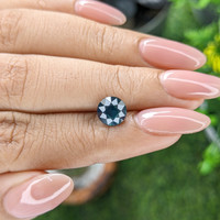 1.76 Ct. Greenish Blue Sapphire from Madagascar Life Style