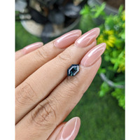1.66 Ct. Greenish Blue Sapphire from Madagascar Life Style
