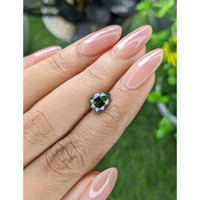 1.74 Ct. Green Sapphire from Madagascar Life Style