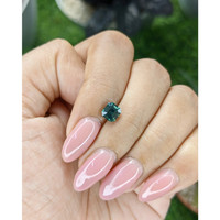 1.12 Ct. Bluish Green Sapphire from Madagascar Life Style
