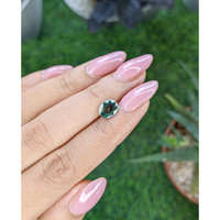 1.54 Ct. Bluish Green Sapphire from Madagascar Life Style