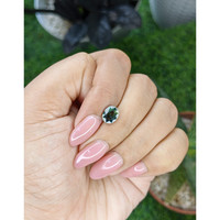 1.54 Ct. Bluish Green Sapphire from Madagascar Life Style