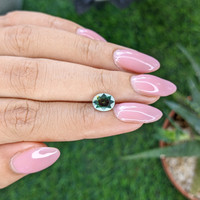 1.54 Ct. Bluish Green Sapphire from Madagascar Life Style