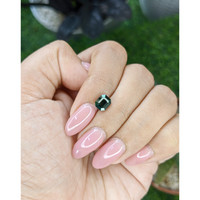 1.58 Ct. Bluish Green Sapphire from Madagascar Life Style