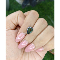 2.05 Ct. Bluish Green Sapphire from Madagascar Life Style