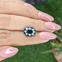 5.33 Ct. Bluish Green Sapphire from Madagascar Life Style