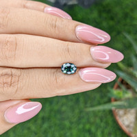 1.19 Ct. Greenish Blue Sapphire from Madagascar Life Style