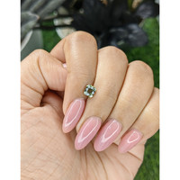 0.77 Ct. Yellowish Green Sapphire from Tanzania Life Style