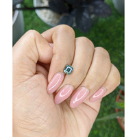 1.15 Ct. Bluish Green Sapphire from Madagascar Life Style