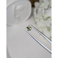 0.74 Ct. Yellowish Green Sapphire from Ceylon (Sri Lanka) Life Style