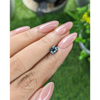 1.00 Ct. Bluish Green Sapphire from Madagascar Life Style