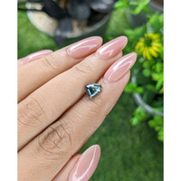 1.55 Ct. Greenish Blue Sapphire from Madagascar Life Style
