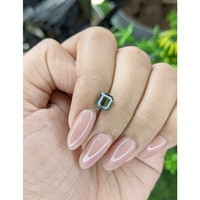 1.52 Ct. Yellowish Green Sapphire from Madagascar Life Style