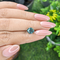 2.03 Ct. Bluish Green Sapphire from Madagascar Life Style