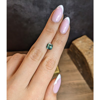 2.07 Ct. Yellowish Green Sapphire from Madagascar Life Style