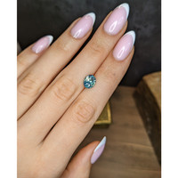 2.62 Ct. Bluish Green Sapphire from Madagascar Life Style