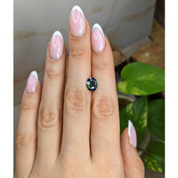 2.16 Ct. Bluish Green Sapphire from Madagascar Life Style