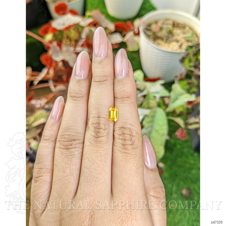 0.99 Ct. Orangish Yellow Sapphire from Ceylon (Sri Lanka)