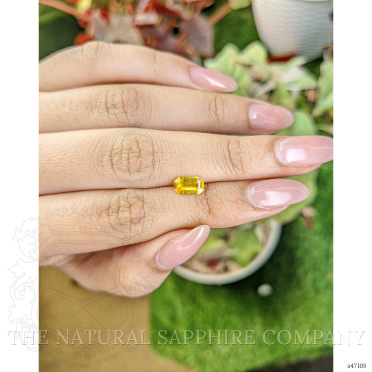 0.99 Ct. Orangish Yellow Sapphire from Ceylon (Sri Lanka)
