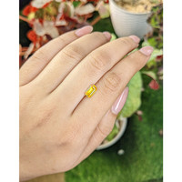 0.99 Ct. Orangish Yellow Sapphire from Ceylon (Sri Lanka) Life Style