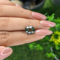 4.06 Ct. Yellowish Green Sapphire from Africa Life Style