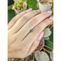 0.59 Ct. Yellowish Green Sapphire from Ceylon (Sri Lanka) Life Style