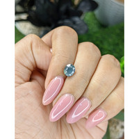1.61 Ct. Bluish Green Sapphire from Madagascar Life Style