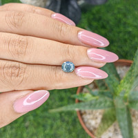 1.61 Ct. Bluish Green Sapphire from Madagascar Life Style