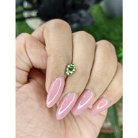 0.99 Ct. Green Sapphire from Madagascar Life Style