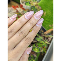0.60 Ct. Greenish Yellow Sapphire from Ceylon (Sri Lanka) Life Style