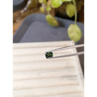 0.97 Ct. Bluish Green Sapphire from Madagascar Life Style