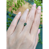 1.13 Ct. Yellowish Green Sapphire from Madagascar Life Style