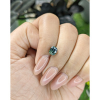 1.56 Ct. Bluish Green Sapphire from Madagascar Life Style
