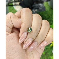 1.61 Ct. Yellowish Green Sapphire from Tanzania Life Style
