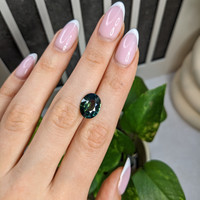 5.48 Ct. Bluish Green Sapphire from Madagascar Life Style