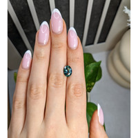3.21 Ct. Bluish Green Sapphire from Madagascar Life Style
