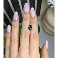 2.57 Ct. Bluish Green Sapphire from Madagascar Life Style