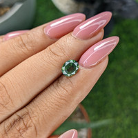 1.39 Ct. Yellowish Green Sapphire from Africa Life Style