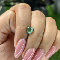 1.05 Ct. Yellowish Green Sapphire from Africa Life Style